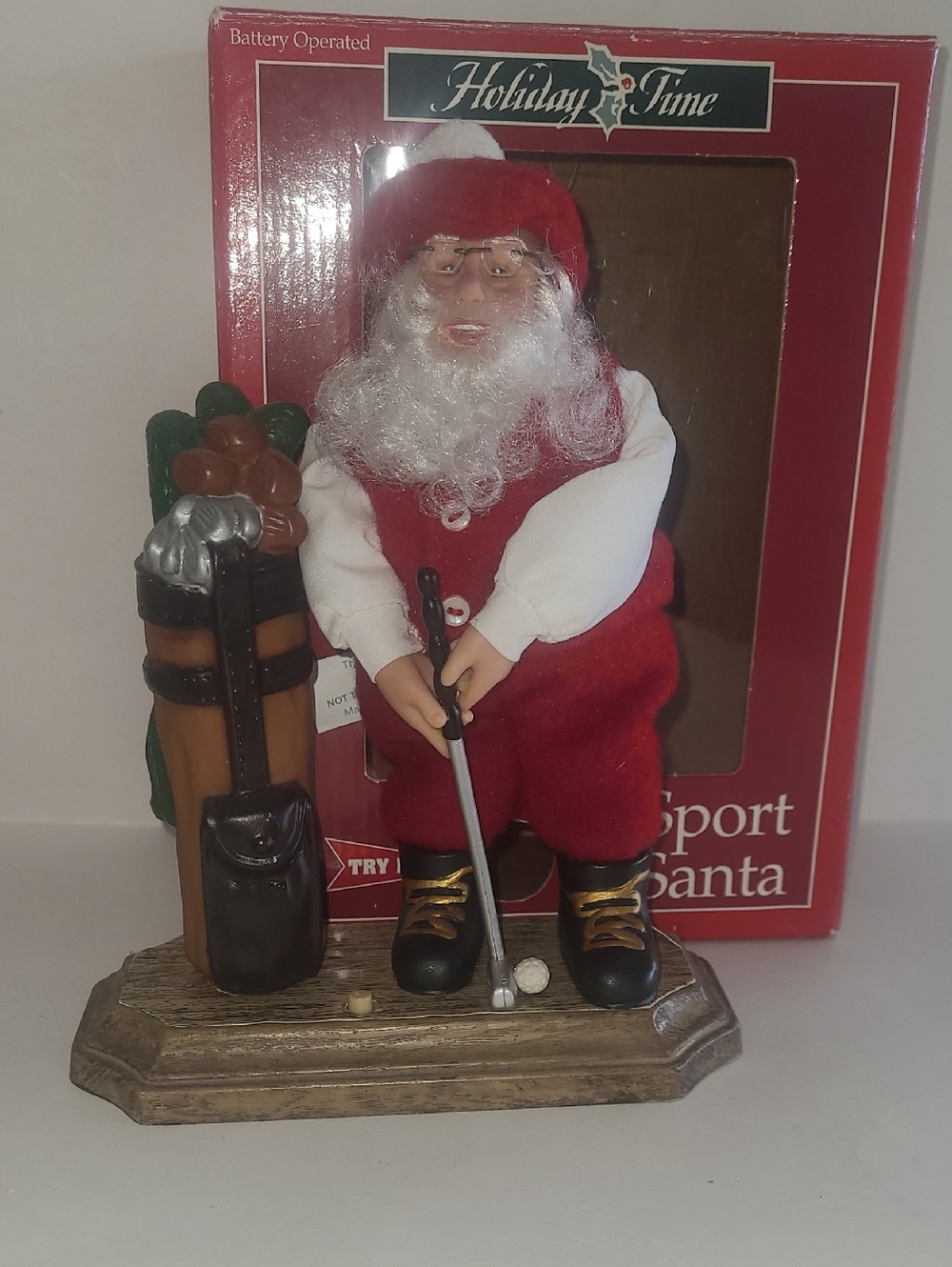 Vintage Musical Golf Santa